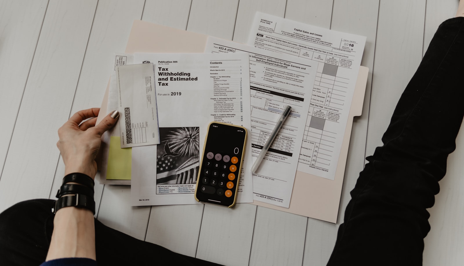 Contractor reviewing lead sources and close rates